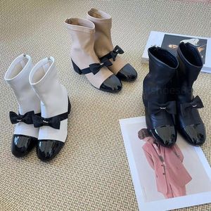 ankelstövlar designer kvinnors stövlar klack med bågknut äkta läder låg häl stövlar chunky block heel booties cap toe toe heel comfy modeklänskor