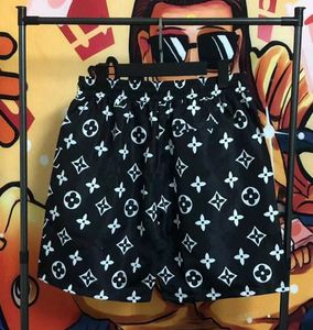 23SS Mens Diseñadores para mujer Shorts Fashion Streetwears Ropa de secado rápido Impresión de trajes de baño Pantalones de playa