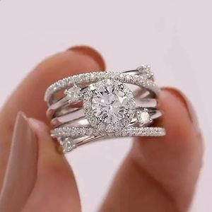 ソリティアリングHuitan Luxury Wedding Rings for Women Fancy Cross Design Inlaid Shiny CZ Stone Fashion汎用性のある女性の指先ギフトジュエリー231116