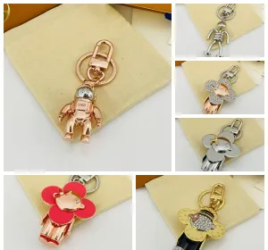 Designer Cartoon KeyChain Luxury Women Mens Keyring High Quality Car Keyring Lover Gold Black Metal Small Smycken Charm Bag Pendant Jewelry Good Gift 2311175d