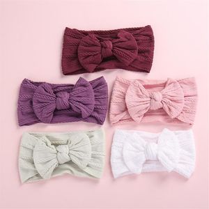 Knot Bow nylon pannband kabel stickade nylonhuvud wraps pompom trim bred turban pannband baby flickor hår tillbehör280p