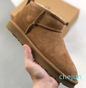 Damen-Winterstiefel mit flachem Boden, Luxus-Designer, klassischer Buchstabe, Hirsch-Samt-Leder-Obermaterial, kurzes Fass, dicker Boden, rutschfeste Damen-Booties