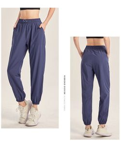 lu lu women jogging womens yoga ninth pants pocket fiess leggingsソフトハイウエストヒップリフトエラスティックカジュアルパンツドローストリングレギング高品質ホット