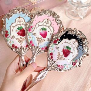 Compact Mirrors Flower Knows Strawberry Rococo Lip Glaze Hand-held Mirror Makeup Tool Portable Small Mirror to Carry Handle Mirror 231116