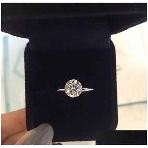 Solitaire Ring har stämpel Claw 1-3 Karat CZ Diamond 925 Sterling Sier Rings Anelli för kvinnor gifter sig med bröllopsengagemangsälskare GI DHVKN