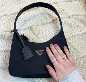 Women 'Saffiano Reedition Nylon Counter Bag Luxury The Tote Handbag Prads Beach Envelope Crossbody Designer Bags Man Canvas Pink Clutch Messenger الأزياء