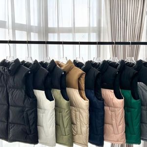 디자이너 1996US 상단 남성 여성 Vest Down Sleeveless Puffer Jacket 가을 겨울 위장 얼굴 복어 몽타주 재킷 조끼 재킷