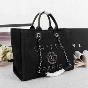 Luxury Women's Fashion Classic Canvas Beach Bag stora kapacitet Små kedjepaket stora handväskor Thh3 Designer Handväska onlineförsäljning