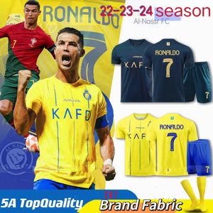 12h frakt Al Nassr FC Soccer Jerseys Ronaldo 2023 2024 Hem Away Cr7 Gonzalo Mane Martinez Talisca Women Fans Player Mens Kids Kit Football Shirt Al-Nassr