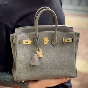 Platinum Bag Designer Tote Togo Top Layer Cowhide Lychee Guld Guld Buckle Leather Women's Large Capacity Pendlar Mortile One Shoulder Handbag