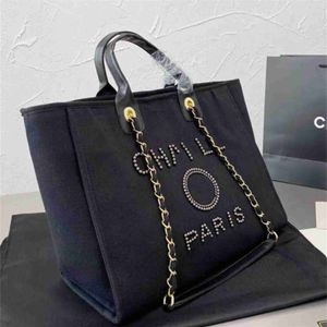 Moda de luxo feminina clássica lona saco de praia grande capacidade pequenos pacotes de corrente grandes bolsas 55w0 designer bolsa venda on-line