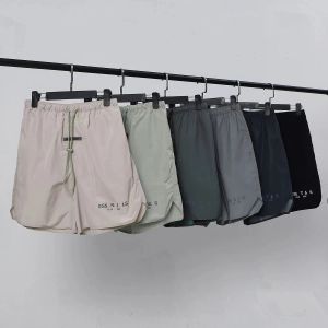 Mens Verão Casual Calça Curta Mais Novo Designer Homens Moda Hip Hop Carta Imprimir Calças Calças Mans Mulheres Multicolor Trendy Shorts Soltos Corredores Sweatpants AM12