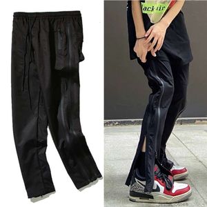 Tasarımcılar Sıradan Pantolon Street Giyim Jogger Pantolon Swearpants 22ss High Street Fermuar Sıfırlık Sıradan Bölünmüş İş Giyim Pantolon Vibe Rahat Moda Erkekleri