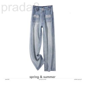 Kvinnors jeansdesigner high-end diamant utsmyckade denim jeans för kvinnor på våren och sommaren, nytt blixt tunga hantverk, hög midja smala dragbyxor tqhw