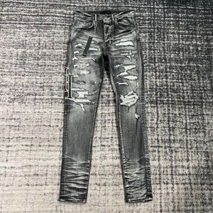 Erkek kot pantolon skinny jeans erkek tasarımcıları jean streç pantolon siyah eşleşen deri mektup yorgan yırtık düz diz pantolon hip hop sokak pantolon