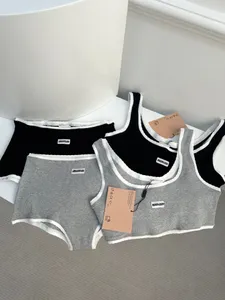 Design de luxo feminino cor sólida senhoras conjunto magro gola em u sem mangas colheita topos e cintura alta mini shorts terno conjunto de duas peças