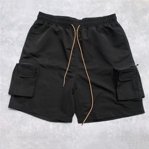 Herr shorts sommar svart militär last jogger män löst passande dragstring svett kort streetwear nio-pocket styling 230419