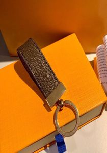Kutu ve toz torbası ile unisex moda anahtarlık 2021 Tasarımcı El yapımı anahtar zincirleri 4 renk çanta çantaları anahtar kolye tokası aksesuarları2674032
