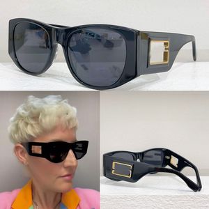 Übergroße ovale Baguette-Brille, FF Havana-Acetat. Bügel mit ausgeschnittenem Baguette-Logo und goldfarbenem Metallbesatz. Übergroße ovale Designer-Sonnenbrille FOL072