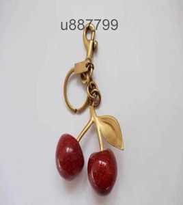 Keychain cherry style red color Chapstick Wrap Lipstick Cover Team Lipbalm Cozybag parts mode fashion9126782Z0VG