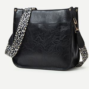 Versatile shoulder bag with fashionable crossbody leopard print shoulder strap design PU solid color women's bag