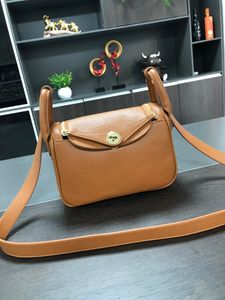 Dagpaket 24SS Kvinnors handväska Ins Simple Leather Grils Axelväska med Lychee Mönster Fahsion Crossbody Bag