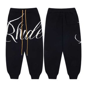 デザイナーの衣料パンツRhude春、新しい男性のカジュアルジャックレターニットパンツIns High Street Trend Brand Leggings Streetwear Jogger Oun