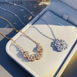 Collana pieghevole con zirconi intarsiati in acciaio inossidabile di vendita calda Collana con pendente magnetico a forma di quadrifoglio a forma di cuore