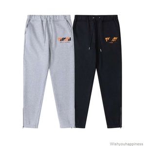 Designer Pantaloni casual Pantaloni Pantaloni sportivi Autunno Inverno Nuovo Trapstar Giallo Nero Asciugamano ricamato Peluche Maglione con cappuccio Pantaloni con cerniera primo piano Pantaloni da guardia casual