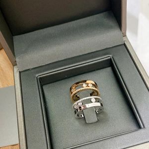 Bröllopsringar Luxury Original Jewelry Move Series S925 Herr- och kvinnors ringar Stone Glid Ring Messica MER MER Vänligen öppna videon till VI 231118