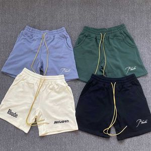 デザイナー服ショートカジュアル Rhude マクラーレンショーツ夏新ハイストリート巾着フォグカプリパンツメンズルーズフィットスタイルトレンドカップルジョガースポーツウェア