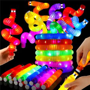 Świąteczne materiały zabawek 6PCS Pop Lid Led Sensory Toys Pull Stretch Tube Toddlers Prezenty Dzieci Lumowiste Popping Party Materiały 231121