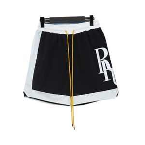 デザイナー服ショートカジュアル Rhude 新 22ss ハイストリートトレンディなスプライスコントラストスポーツレジャーバスケットボールビーチナイロンショーツ男性カップルジョガースポーツウェア