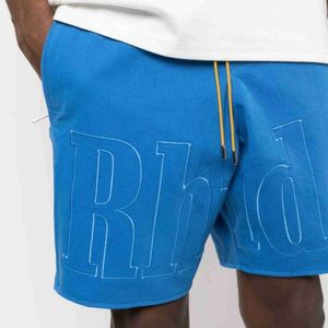 Designerkleidung kurz lässig Rhude Brief bestickt Kordelzug Shorts Herren Sommer Baumwolle lose High Street Mode Jugend groß Os Style Sport Running Fitness