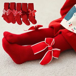 Kids Socks Christmas Baby Girls Knitted Socks Autumn Red Big Bowknot Stockings Kids Ribbed Pantyhose Winter Warm Infant Leggings Clothes 231121
