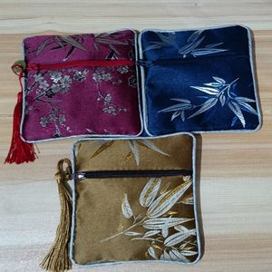 Bolsa de joalheria de zíper de pano de bambu personalizada sacos de presente de bracelete de seda chinesa Bolsa de moeda de moeda de moeda de porte de atacado 50pcs/lote