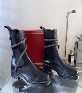 UGGsity strass Snake Strass Stivaletti grossi avvolgenti in pelle nera da donna con tacco basso Martin Boots pesanti marchi di stilisti di lusso 1619152