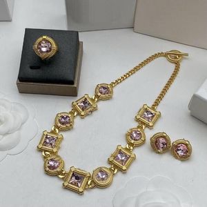 Neuer Luxus entwarf purpurrotes Kristallanhänger-Halsketten-Armband-Ohrring-Todesfee-Medusa-Kopf-Porträt-18K Gold überzogene Frauen-Schmucksache-Satz-Geschenke HMS14 --H4