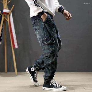 Jeans masculinos homens retro azul impresso designer grande bolso casual calças de carga hombre hip hop corredores solto rasgado