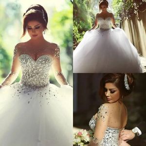 Designer di lusso Cristalli Maniche lunghe Abiti da ballo Abiti da sposa Strass Allacciatura sul retro Abito da sposa arabo Collo trasparente Abiti da sposa