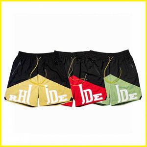 Designer Clothing Rhude Shorts American High Street Trendy Letter Dual Color Patchwork Drawstring Five Point Beach Pants Couples Joggers Sportswear