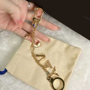 Luxury Designer Fashion Keychains Brand Key Buckle Flower Letter Key Chain Handmade Gold Mens Womens Bag Pendant gift