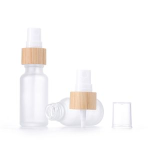 Frosted /bärnstensglassprayflaskor med bambuspumphuvud parfymatomizer Travel Kosmetiska vätskebehållare