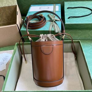 10A designer designed mini bucket bag brown leather gold hardware crossbody bag 19.6-inch drooping adjustable shoulder strap drawstring closure 23cm belt box.