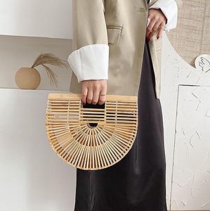 Bolsas noturnas características chinesas requintadas nicho de nicho hollow semi-circular de bambu bambu saco de tecido internet celebridade ao ar livre praia retro bolsas