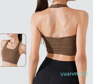 Yoga outfit med logotypbh -säker halter sport underkläder kvinnors nylon ihåliga slim -fit gym topp sexig casual street väst