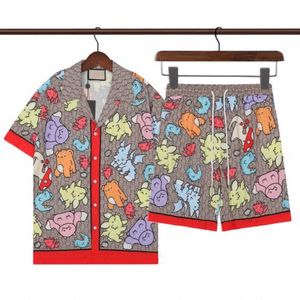 デザイナーシャツメンズボタンアップシャツプリントボウリングシャツハワイフローラルカジュアルTシャツ男性スリムフィット半袖ドレスハワイ