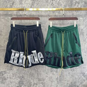 Roupas de grife Tecido de malha Rhude Shorts de couro com letras bordadas Calça de moletom masculina Five Point Tubo reto Casais Joggers Roupas esportivas