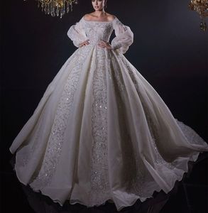 Luxury Ball Gown Wedding Dresses Bateau Long Sleeves Sequins Appliques Beaded Floor Length Ruffles 3D Lace Diamodns Train Bridal Gowns Plus Size Vestido de novia