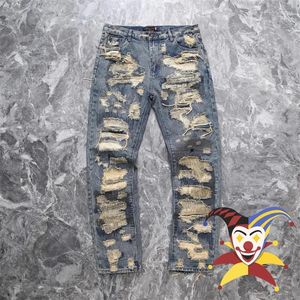 Jeans da uomo lavati toppe ricamate danneggiate pantaloni vintage in denim da uomo e da donna